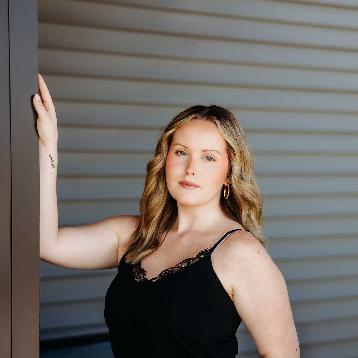 Portrait of Gabrielle D., a professional stylist at Revive Salon & Spa, showcasing their expertise and style.